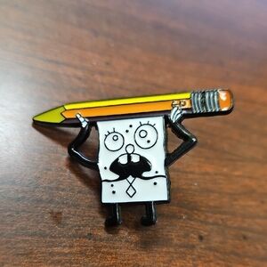 Nickelodeon Black and Yellow Brooch